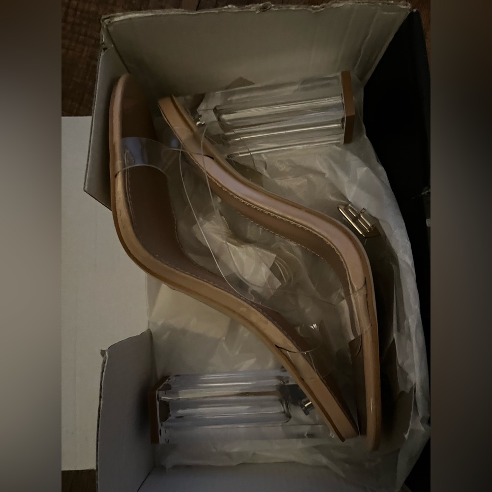 Fashion Nova ankle heels, unworn in packaging. Clear straps and cream sole.